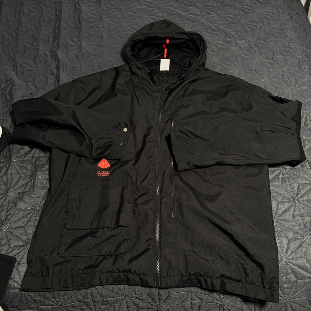 Nike Black Hooded Windbreaker with Red Radiant Basketball Graphic